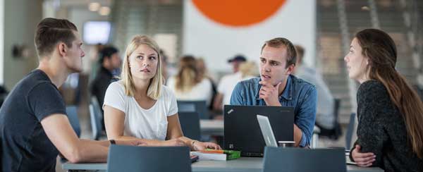 Students doing group work in the S building Photo: Aarhus University